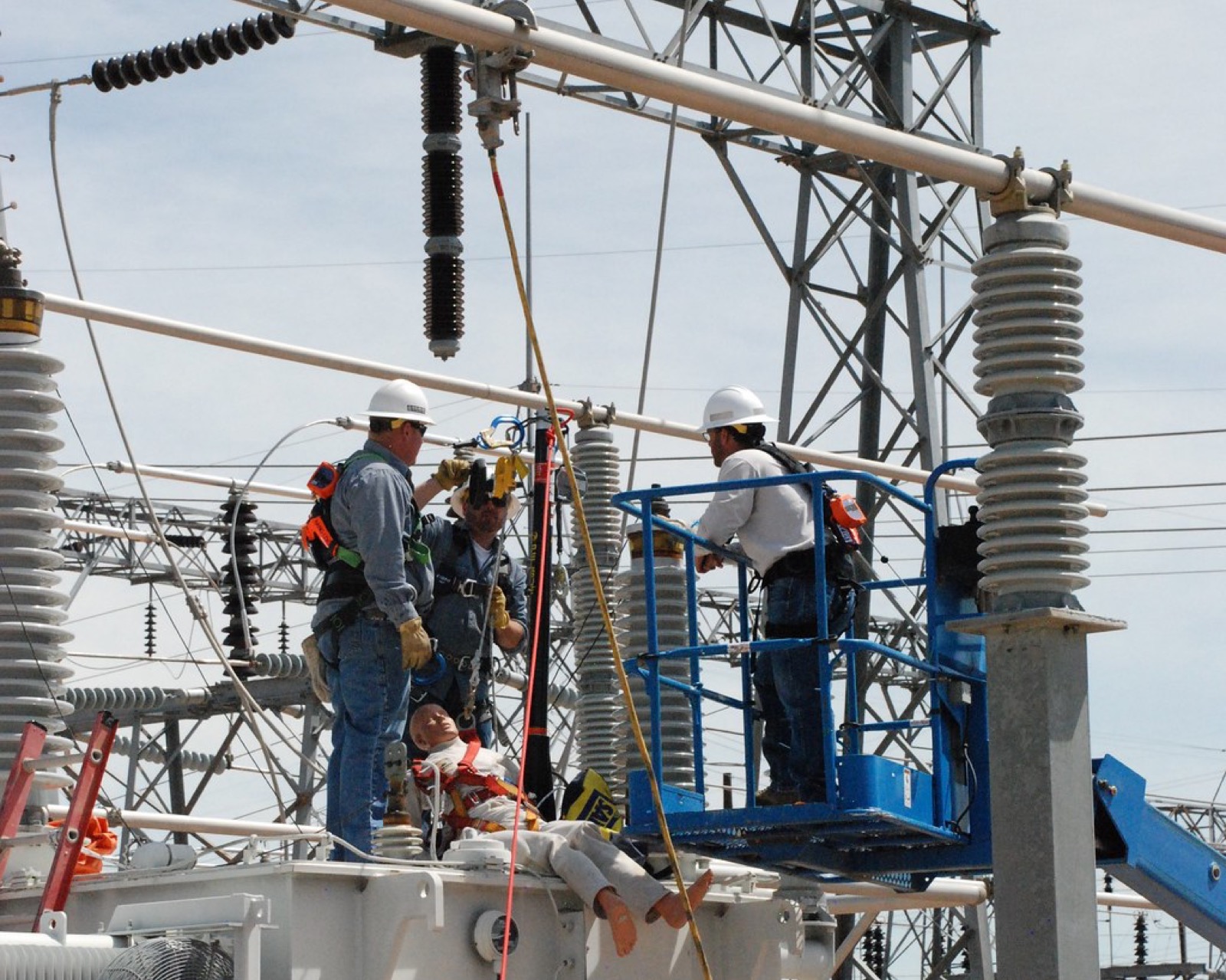 Utility crew working on a power substation